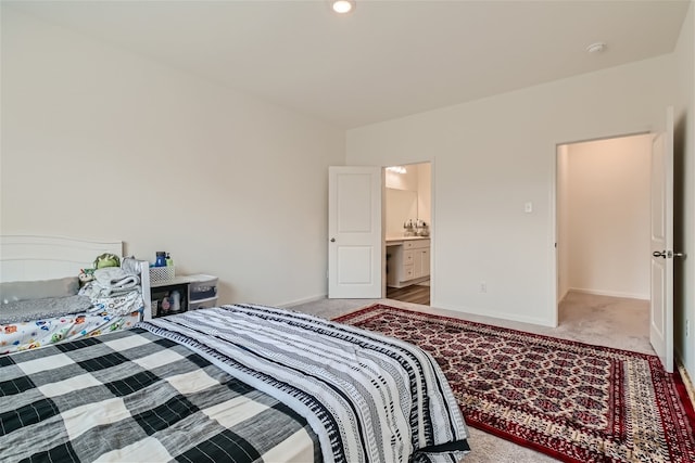 bedroom featuring light carpet