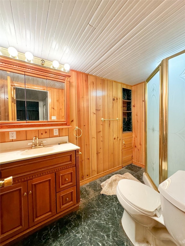 bathroom featuring vanity, toilet, wooden walls, and wooden ceiling