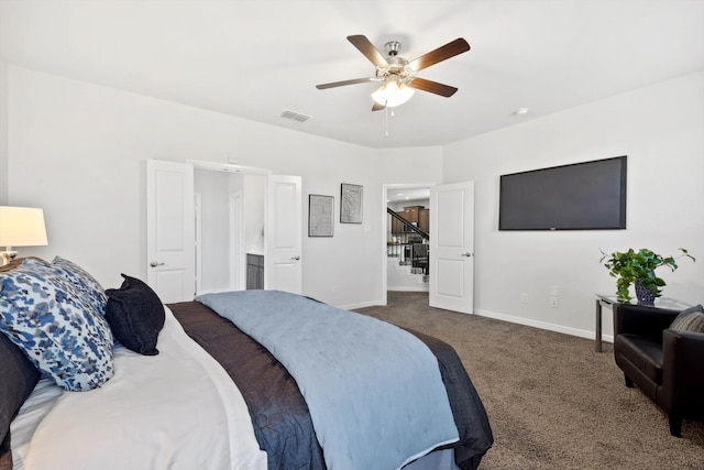 bedroom with ceiling fan and dark carpet