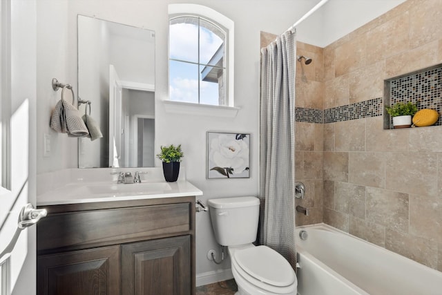 full bathroom with shower / bath combination with curtain, vanity, and toilet