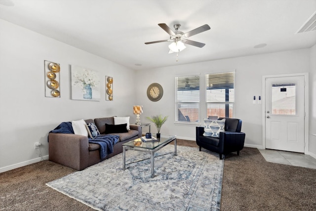 living room with light colored carpet and ceiling fan