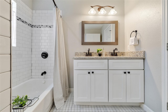 bathroom with tile patterned flooring, vanity, and shower / bath combo with shower curtain