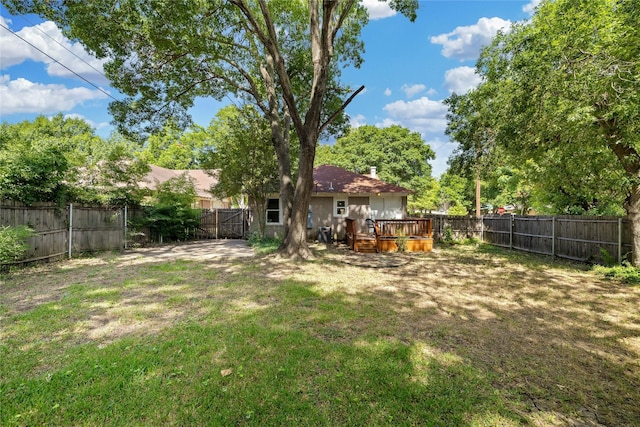 view of yard with a deck