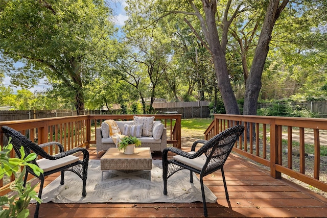 deck featuring outdoor lounge area