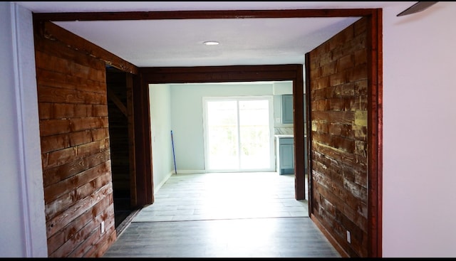 hallway featuring hardwood / wood-style flooring