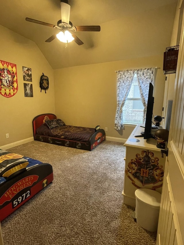 carpeted bedroom featuring ceiling fan and vaulted ceiling