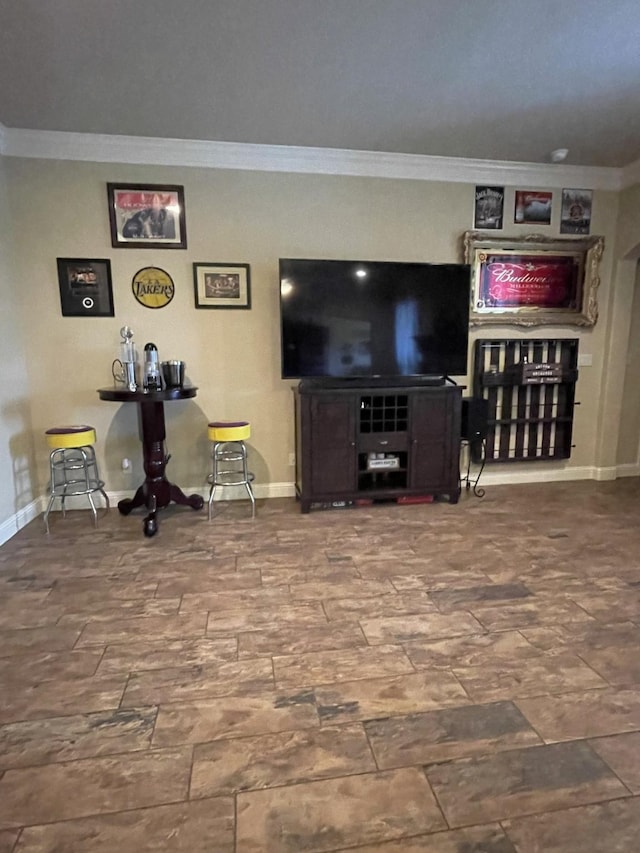 living room with ornamental molding