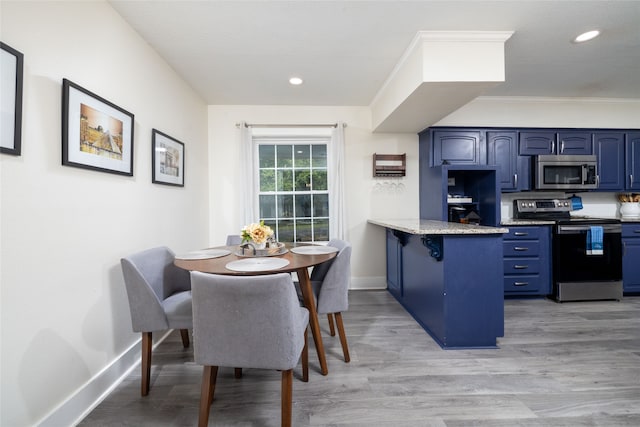 dining room with dark hardwood / wood-style floors