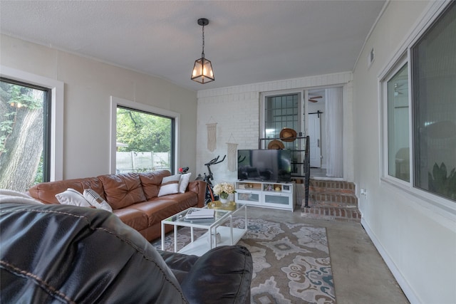 living room featuring crown molding, lofted ceiling, and carpet floors