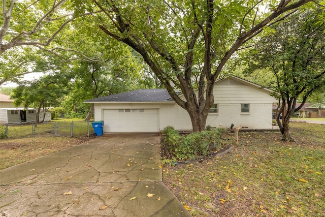 view of side of property featuring a garage