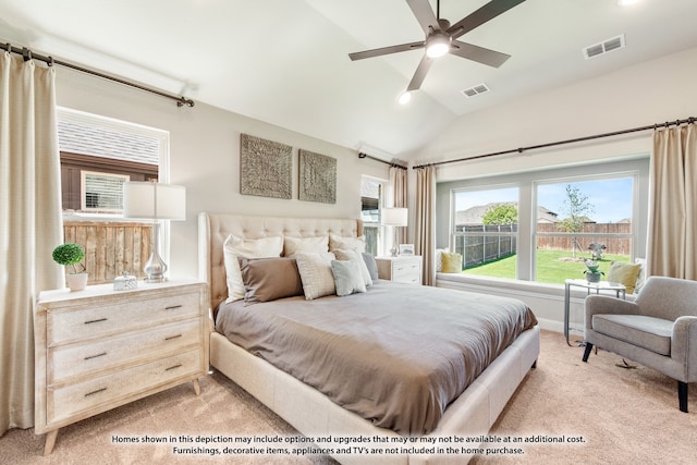 bedroom with lofted ceiling, light carpet, and ceiling fan