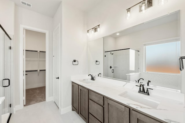 bathroom featuring vanity and separate shower and tub