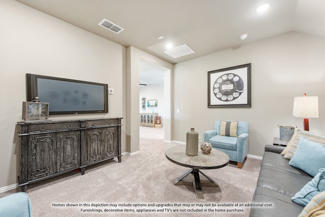 carpeted living room with lofted ceiling