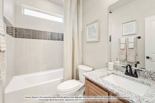 full bathroom with vanity, toilet, and shower / tub combo