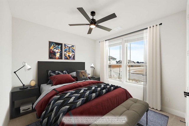 carpeted bedroom featuring ceiling fan