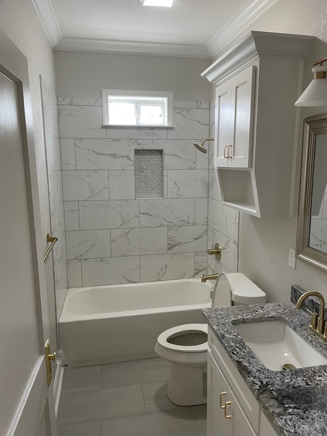 full bathroom featuring vanity, tile patterned flooring, toilet, and tiled shower / bath