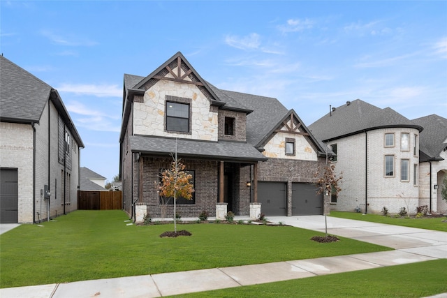 view of front facade featuring a garage and a front yard