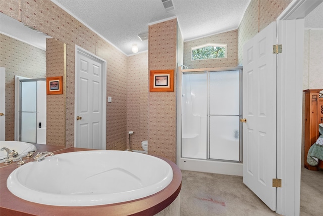 bathroom with shower with separate bathtub, vaulted ceiling, and a textured ceiling