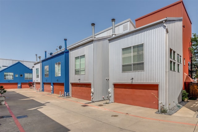 view of property exterior featuring a garage