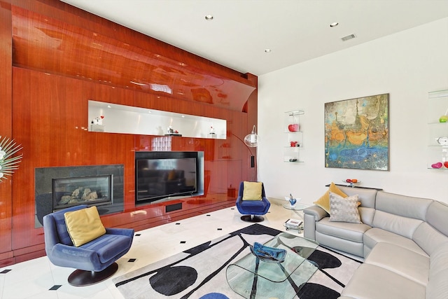 living room featuring wooden walls