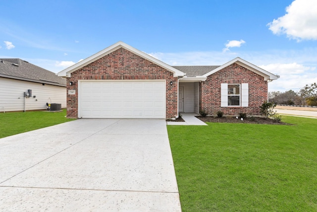 ranch-style home with a garage, central AC unit, and a front yard