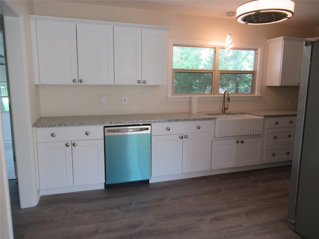 kitchen featuring dark hardwood / wood-style floors, sink, white cabinetry, and stainless steel appliances