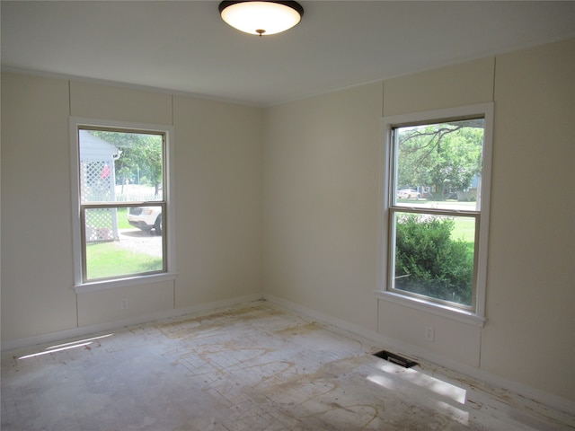 empty room featuring plenty of natural light