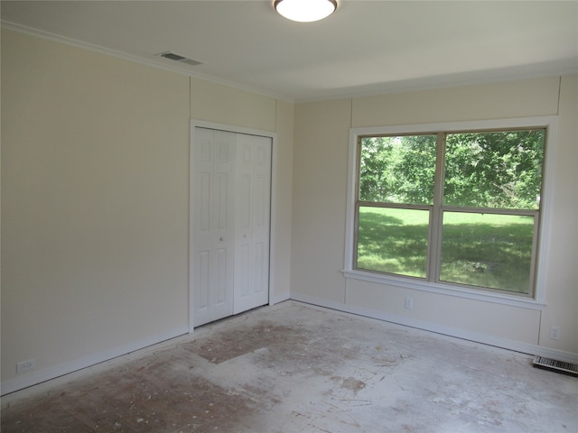 unfurnished bedroom with a closet