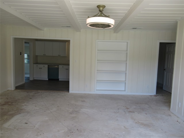 interior space featuring beamed ceiling and built in shelves