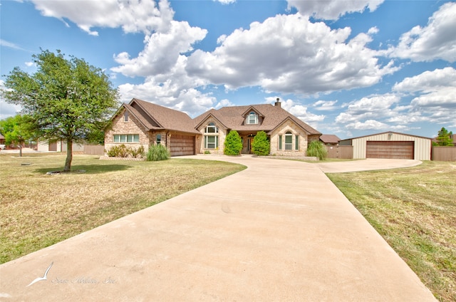 view of front facade with a garage and a front yard