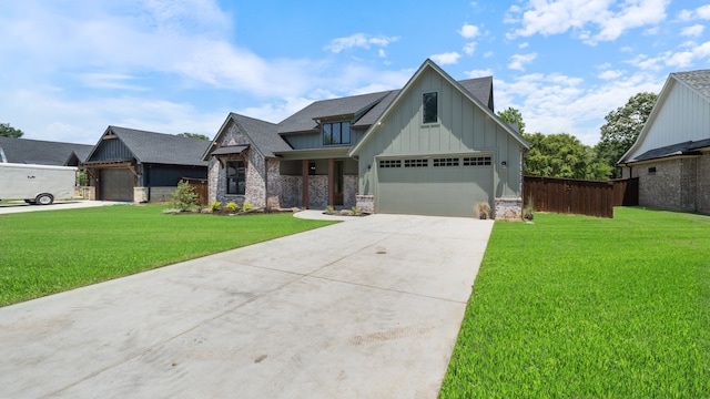 view of front facade with a garage and a front lawn