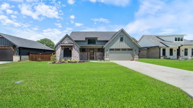 craftsman-style house featuring a garage and a front lawn