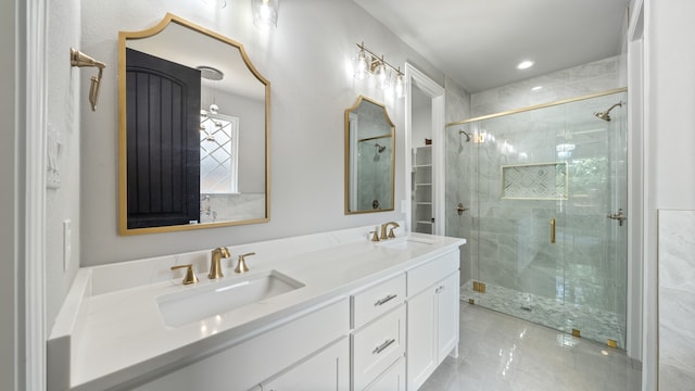 bathroom with tile patterned flooring, double sink vanity, and an enclosed shower