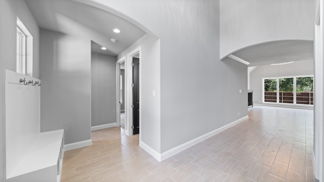 hall with light wood-type flooring