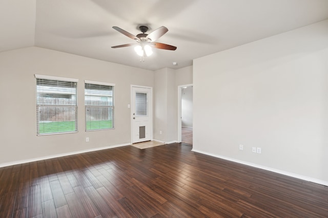 spare room with lofted ceiling, ceiling fan, and hardwood / wood-style floors