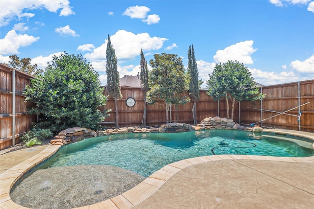 view of swimming pool featuring a patio