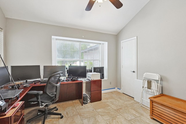 tiled home office featuring lofted ceiling and ceiling fan