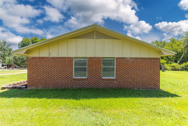 view of property exterior featuring a yard