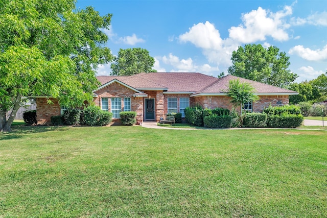 ranch-style house with a front yard