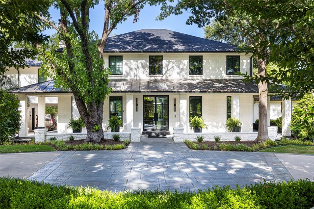 view of front of property featuring covered porch