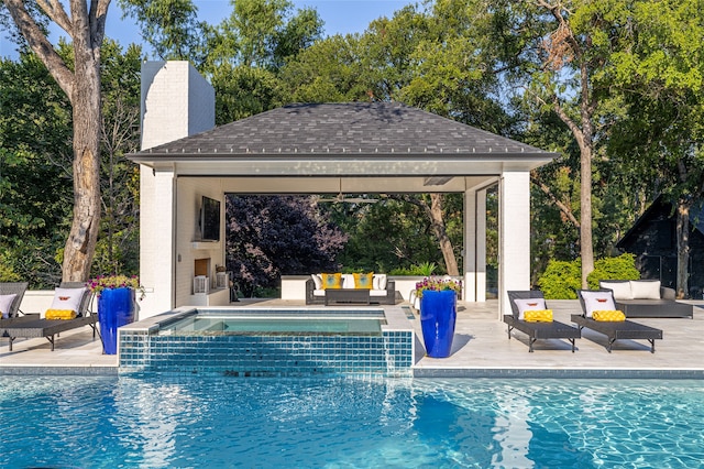 view of swimming pool with an outdoor hangout area, a patio, and a gazebo