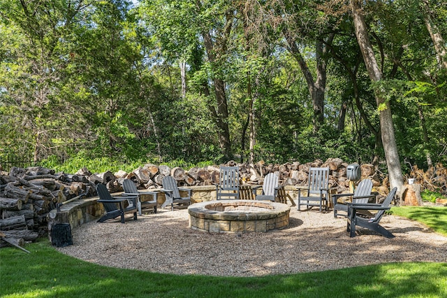 exterior space with an outdoor fire pit