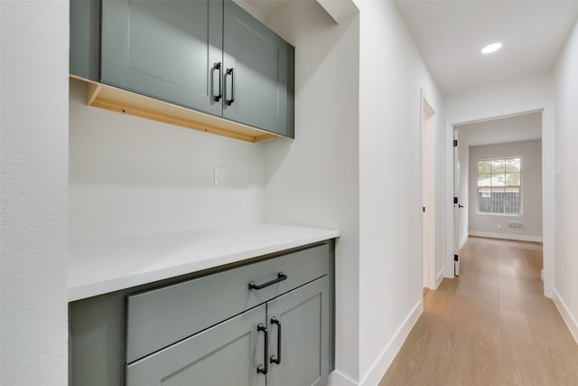 corridor featuring light hardwood / wood-style floors