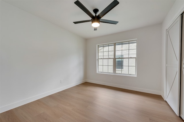 unfurnished bedroom featuring light wood-type flooring and ceiling fan