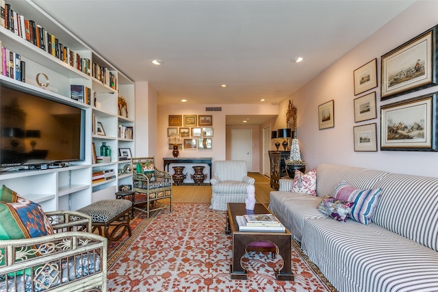 living room with light hardwood / wood-style flooring