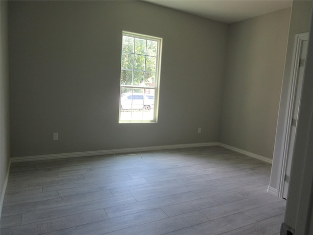 empty room with light wood-type flooring