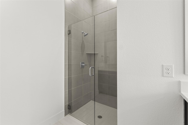 full bathroom with a stall shower