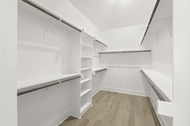 walk in closet featuring light wood-style floors