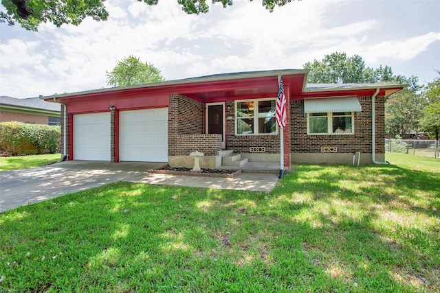 ranch-style home with a garage and a front lawn