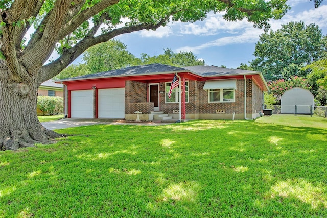 view of front of home featuring a garage and a front yard